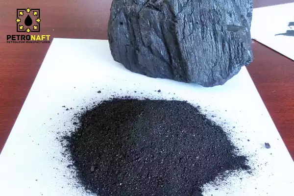 Some Gilsonite or Natural Asphalt or Natural Bitumen powder and lumps