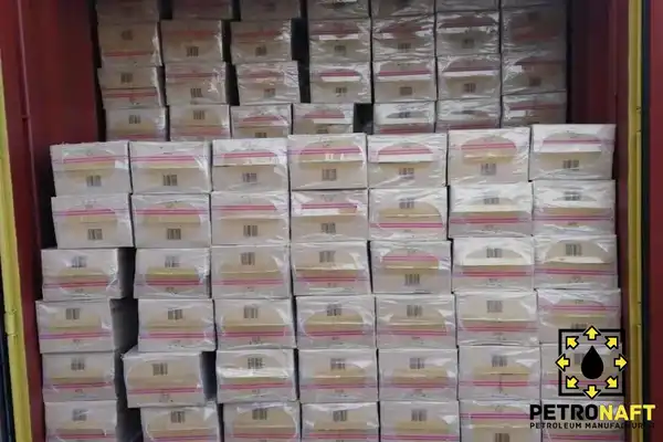 Cartons of paraffin wax in a container