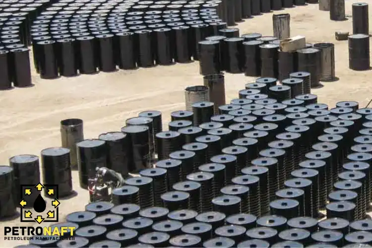 Barrels of bitumen in a production yard, linked to Iran Bitumen Manufacturers