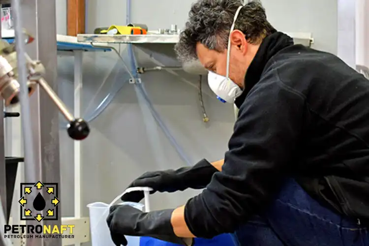 Worker in a factory using Caustic Soda for Cleaning Product